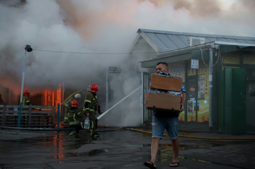 In Kyiv, an iconic outdoor book market at Pochaina was struck -- long the place to find rare and antiquarian editions. — STRINGER / AFP