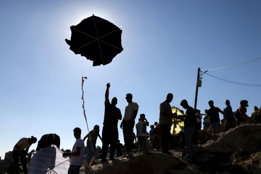 Palestinians from the  village of Burin in the Israeli-occupied northern West Bank celebrate the annual kite festival, saying it was their defiance against Israeli settlers in the area