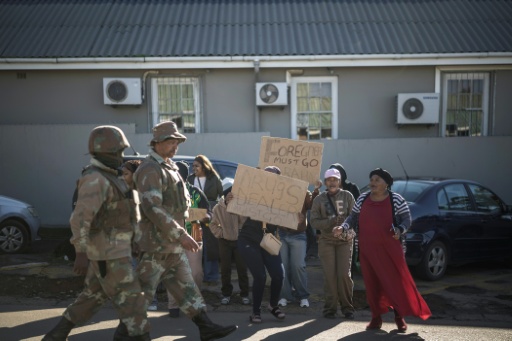 More than 150,000 foreign nationals have left South Africa because of the protests — MARCO LONGARI / AFP