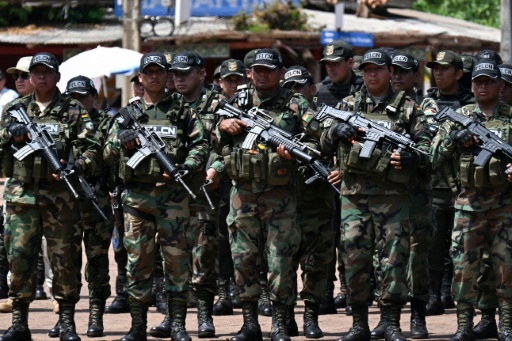 Bolivian police from a special drug task force stand guard as President Rodrigo Paz announces a plan to boost security along the border with Brazil — AIZAR RALDES / AFP