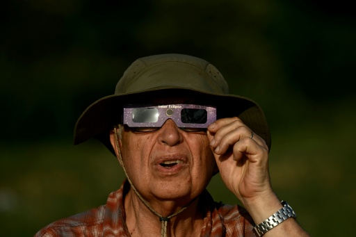 Millions more people watched a partial solar eclipse across Europe — Philippe Lopez / AFP