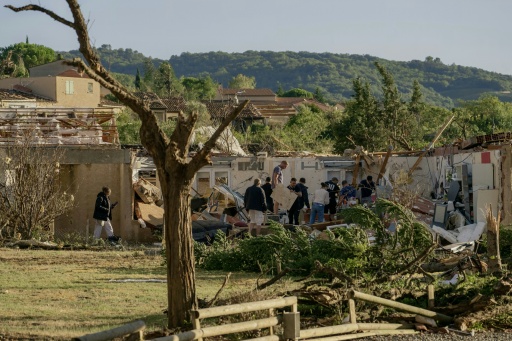Some houses had their roofs torn off — Idriss Bigou-Gilles / AFP