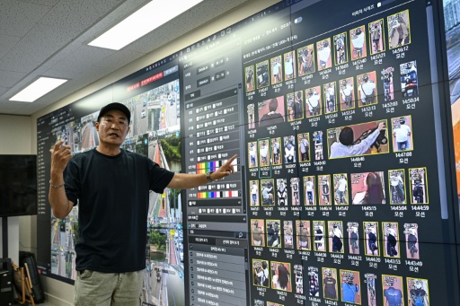 The Hangang Bridge CCTV Integrated Control Center's surveillance system alerts first responders if someone lingers in certain locations, enters an area deemed unsafe or picks up one of the bridges' dedicated suicide-prevention phones — Jade GAO, Jade GAO / AFP