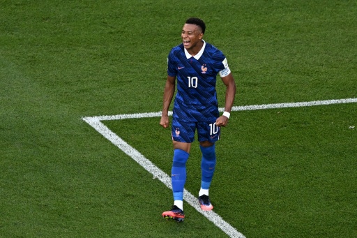 Kylian Mbappe celebrates after France beat Paraguay