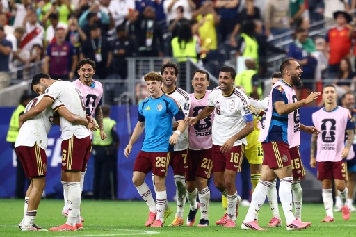 Spain celebrate beating France in their World Cup semi-final