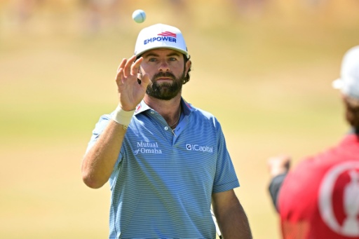 Cameron Young's fourth round 64 set the clubhouse lead at the British Open — ANDY BUCHANAN / AFP