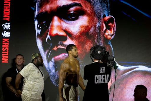 Joshua survives knockdowns, stops Prenga