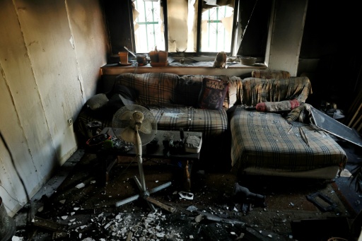 Cette photo montre les dégâts causés par un incendie de forêt dans une maison calcinée à Piedralaves, à 100 kilomètres à l’ouest de Madrid, le 28 juillet 2026 — Oscar DEL POZO / AFP
