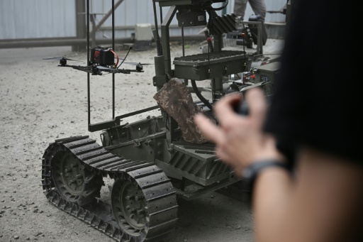 The ground robots mainly help evacuate wounded soldiers or carry out resupply missions — Genya SAVILOV / AFP