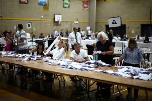 Ballots are counted at the count centre venue for the by-election of the parliamentary seat of Clacton, at Clacton Leisure Centre, eastern England on August 13, 2026 — Henry NICHOLLS / AFP