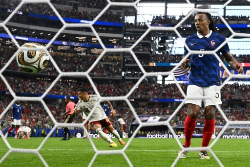 Spain defender Pedro Porro wheels away after scoring his team's second goal in a 2-0 win against France that sent La Roja into the World Cup final