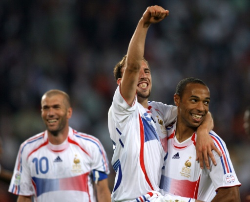 Zinedine Zidane, Franck Ribery and Thierry Henry celebrate after France beat Spain at the 2006 World Cup
