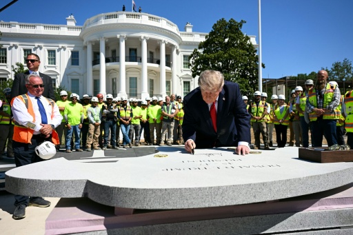Trump unveils White House helipad as building frenzy escalates