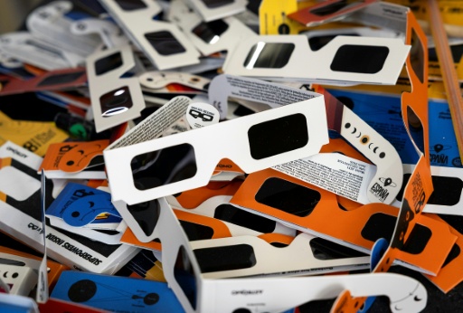 To see a solar eclipse, wear specifically designed glasses that meet the standard ISO 12312-2:2015 — Jaime REINA / AFP