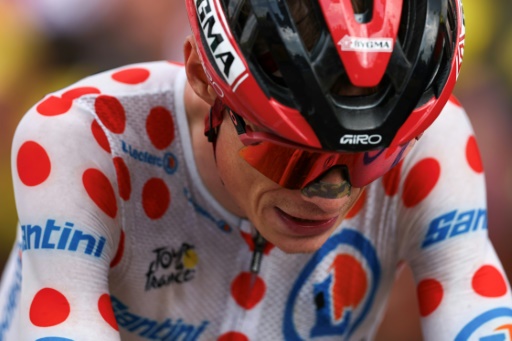 El corredor danés del Team Visma | Lease a Bike, Jonas Vingegaard, con el maillot a lunares, a su llegada a meta en la 14ª etapa del Tour, entre Mulhouse y Le Markstei, el 18 de julio de 2026 — Anne-Christine POUJOULAT / AFP