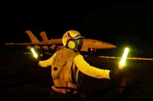 Cette capture réalisée le 22 juillet 2026 d'une vidéo diffusée la veille par le Centcom montre ce que l'armée américaine décrit comme le lancement de frappes de précision sur l'Iran — - / AFP