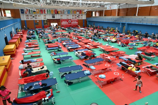 Des personnes évacuées à cause des incendies sont hébergées dans un gymnase à Villaviciosa de Odon, à l'ouest de Madrid, le 25 juillet 2026 — JAVIER SORIANO / AFP
