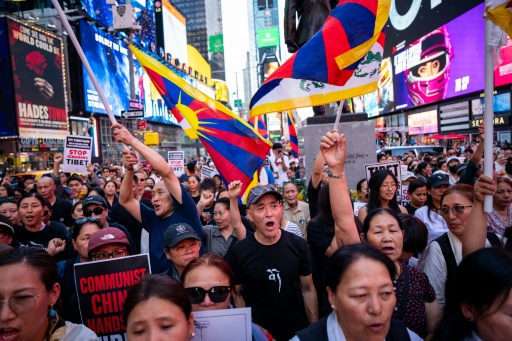 A month after his death, a rally for Tibetan independence and a vigil for Lobga Rangzen was held at Times Square in New York — Angelina Katsanis / AFP