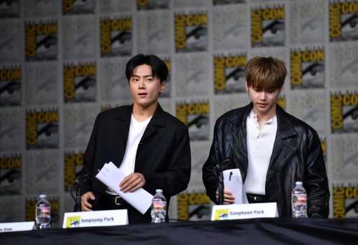 Fans screamed for members of K-pop group Enhypen Jongsung Park and Sunghoon Park during San Diego Comic-Con International — Chris DELMAS / AFP