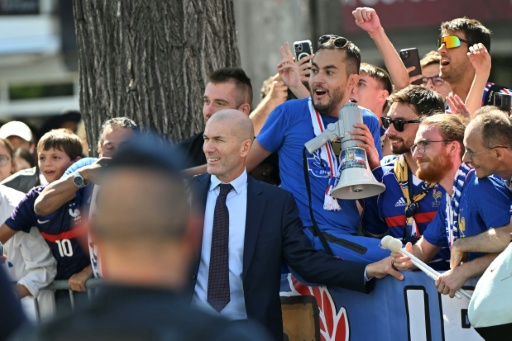 French football fans have faith Zinedine Zidane can succeed as France coach because he is a winner — LOU BENOIST / AFP