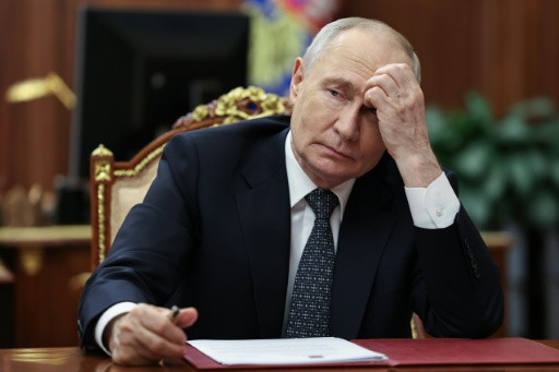 Trump brushed off reports that Russian President Vladimir Putin and China's Xi Jinping were feeding Tehran intelligence to target US forces — Alexander KAZAKOV / AFP