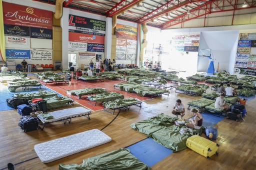 The evacuations were decided as the fire, which broke out Wednesday, got to within a kilometre of the village — Costas METAXAKIS / AFP