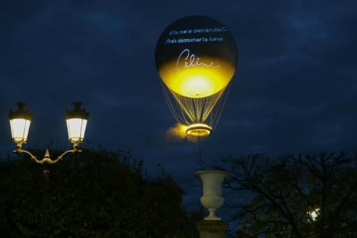The iconic cauldron rose above the Tuileries Garden in tribute to the diva — Thomas SAMSON / AFP