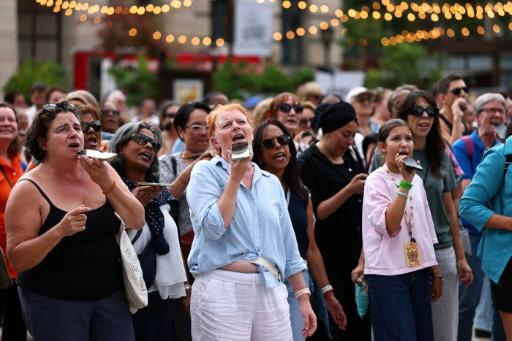 Hundreds turned out for a free singalong in the city's northeast — Anne-Christine POUJOULAT / AFP
