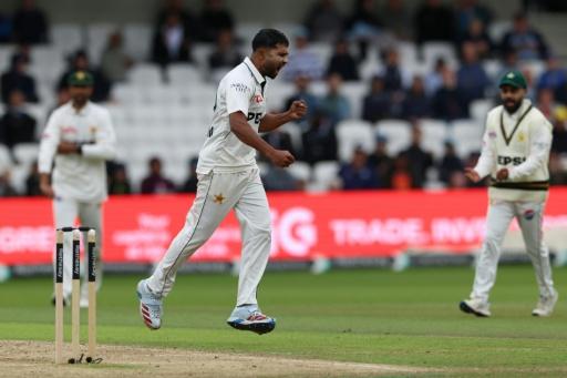 Pakistan's Khurram Shahzad celebrates his dismissal of England captain Joe Root in the first Test at Headingley — Darren Staples / AFP