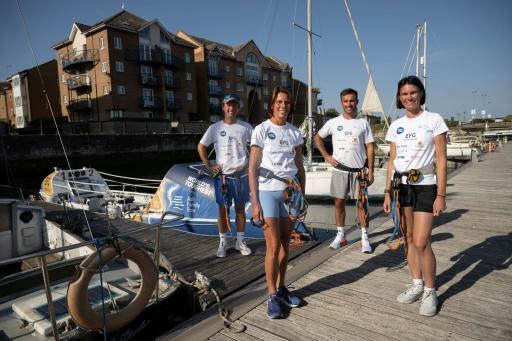 Fighting the taboo of suicide: The Ash family -- Charlotte (2nd L) and her three adult children Henry (L), James (2nd R) and Camilla -- in memory of the children's father, Robert, who took his own life — Oli SCARFF / AFP