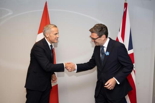 Les Premiers ministres canadien Mark Carney et britannique Andy Burnham le 16 septembre 2026 à Liverpool, en Angleterre — Paul COOPER / AFP