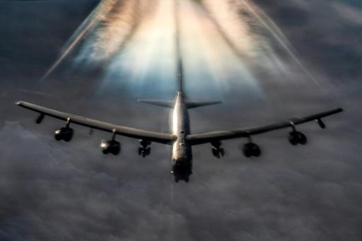 In this US Air Force handout photo released by US Central Command public affairs, a US Air Force B-52H Stratofortress bomber aircraft prepares to refuel from a KC-135 Stratotanker aircraft during Operation Epic Fury over the US Central Command area of responsibility on March 20, 2026. Seven KC-135s have been damaged since the start of the Iran war, according to the US Defense Department's inspector general. — - / AFP