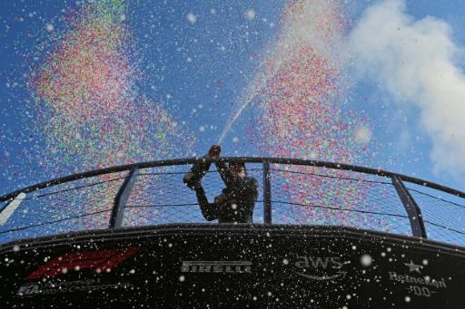 Mercedes' Italian driver Kimi Antonelli sprays Champagne as he celebrates after winning the Italian Formula One Grand Prix at the Autodromo Nazionale Monza circuit in Monza, northern Italy on September 6, 2026. — Andrej ISAKOVIC / AFP