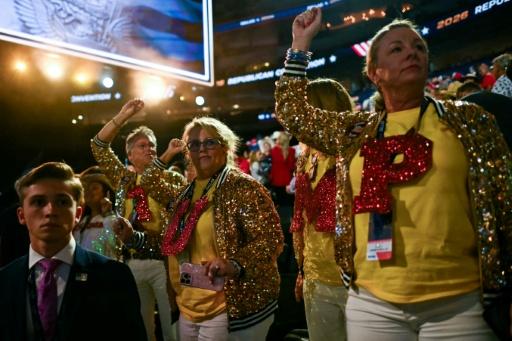 Attendees dance after US President Donald Trump finished his remarks during the Republican National Midterm Convention in Dallas, Texas — Kent NISHIMURA / AFP