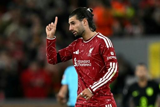 Le milieu de terrain hongrois de Liverpool Dominik Szoboszlai après avoir égalisé contre l'Atlético Madrid, le 9 septembre 2026 en Ligue des champions à Anfield — Paul ELLIS / AFP