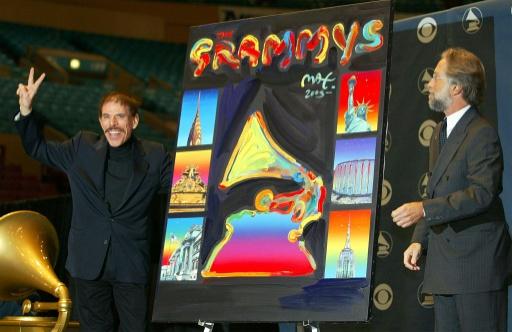 Artist Peter Max (L) was called on to create original artwork for many major events, including the Grammys in 2003 — TIMOTHY A. CLARY / AFP