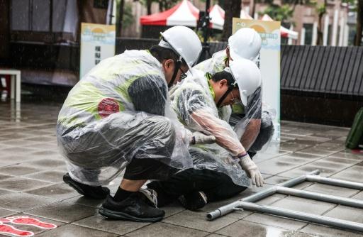 Heavy rain puts a dampener on Taiwan 'extreme heat' drill