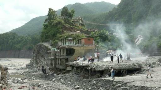 'Hard to bear': Nepalis hold rituals for flood victims on national day of mourning