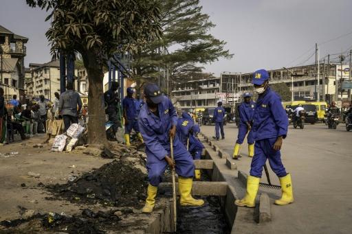 In DR Congo streets, ex-hoods get tough on litter -- and locals