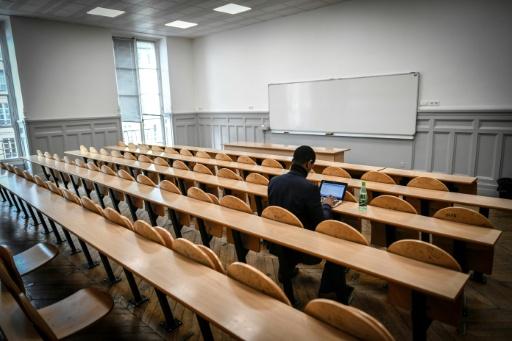 A  student sits in a classroom at Paris I Pantheon-Sorbonne University in Paris on March 30, 2018. — STEPHANE DE SAKUTIN / AFP