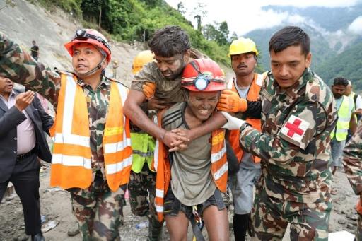 Two hydropower workers have been pulled alive from a tunnel 10 days after it was buried by debris in Nepal — Handout / AFP