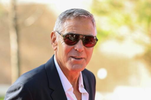 Hollywood star George Clooney lent some of his star power to the summit — Valery HACHE / AFP