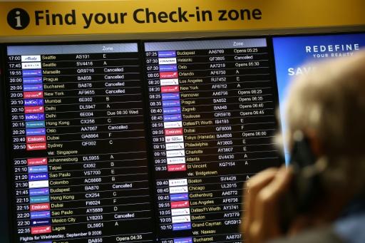 More than 2,000 flights to and from the UK were hit over two days — Henry NICHOLLS / AFP