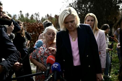 Far-right hopeful Marine Le Pen was visiting people who lost their homes in a wildfire — Philippe LOPEZ / AFP