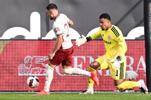 Minnows Augsburg sink Frankfurt to top Bundesliga table