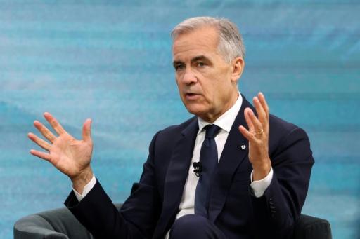 Canadian Prime Minister Mark Carney speaks during the second day of the inaugural Canada Investment Summit in Toronto — VALERIE MACON / AFP