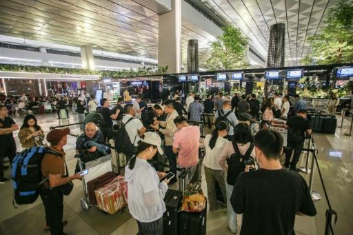 Indonesia's main airport suspends operations after volcanic eruption