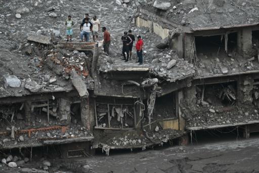 Houses damaged in Nepal's devastating flash floods triggered by a glacier-mountain collapse in August — Pedro PARDO / AFP