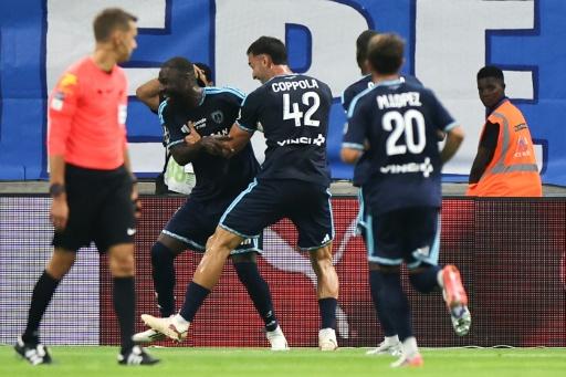 Lassine Sinayoko (L) has scored four goals in three matches this season — Thibaud MORITZ / AFP