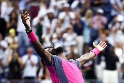 Frances Tiafoe celebrates his five-set victory over fellow American Alex Michelsen in the US Open quarter-finals — CHARLY TRIBALLEAU / AFP